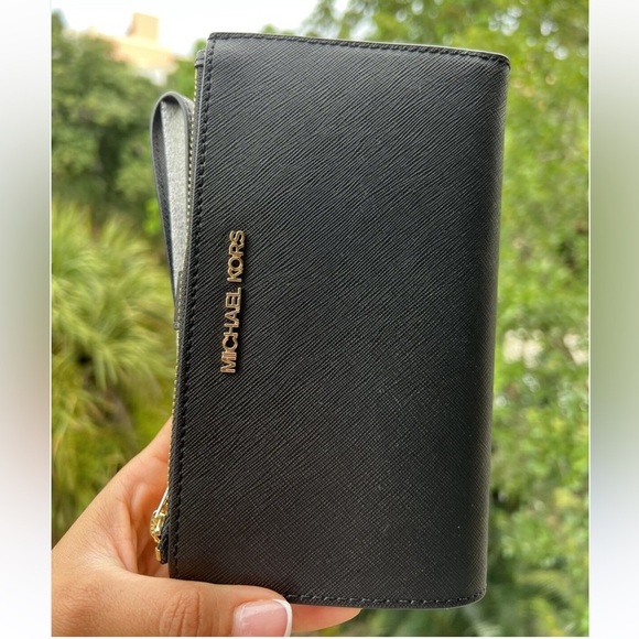 Michael Kors Handbags - Michael Kors Black Saffiano Wristlet wallet  with Gold Logo